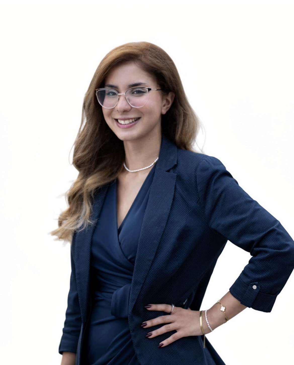 Eurasian woman with brown medium length hair and glasses.